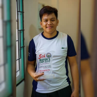 Coach Geo showing his Mayor's cup in 2012 - LILOAN