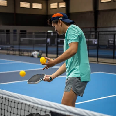 Cebu Pickleball Coach showing proper way to dink