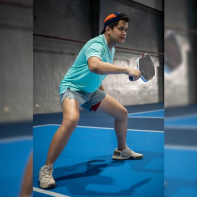 Cebu Pickleball Coach showing proper form for better performance