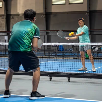 Cebu Pickleball Coach teaching how to perform better in the kitchen line